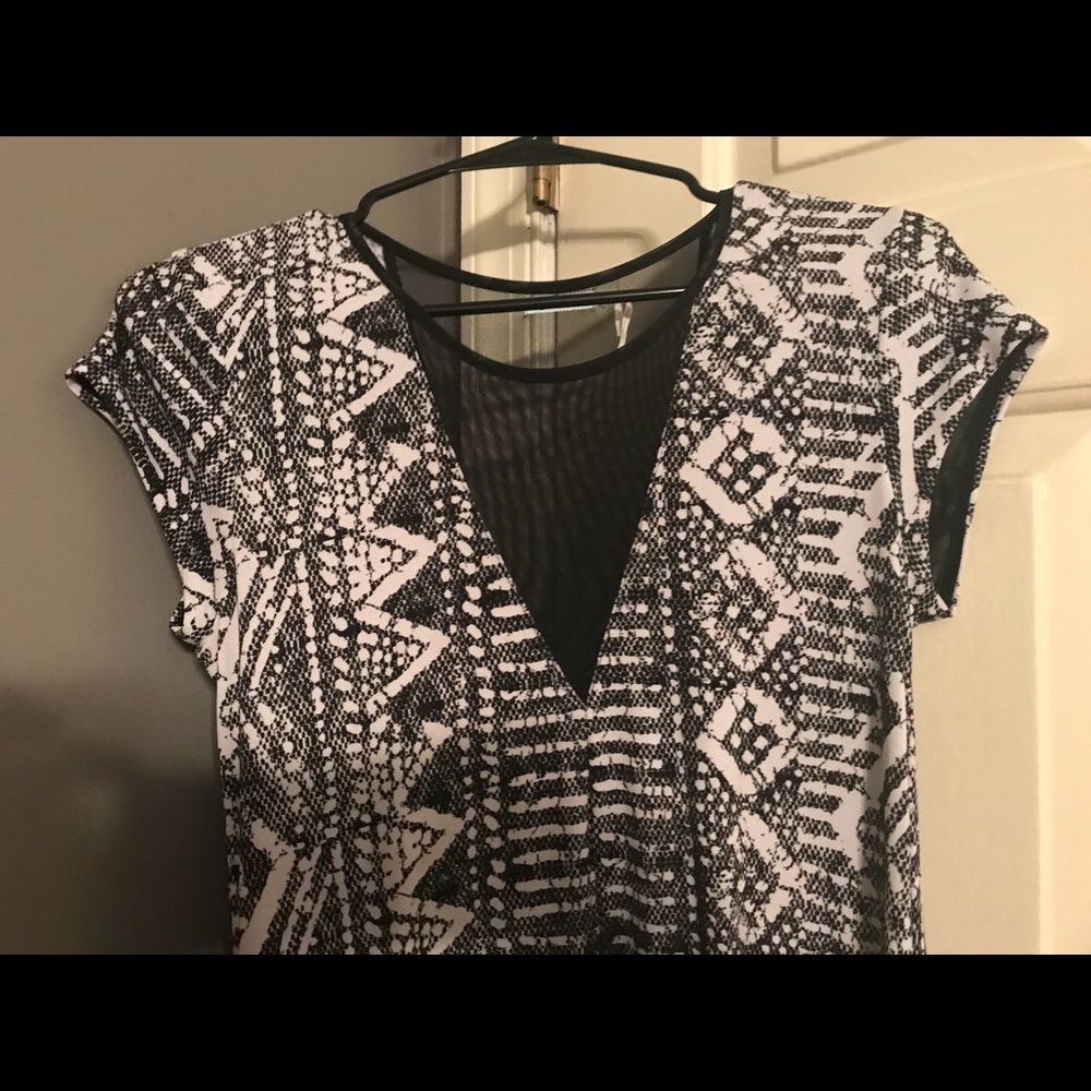 Black and white dress with sheer cut outs.